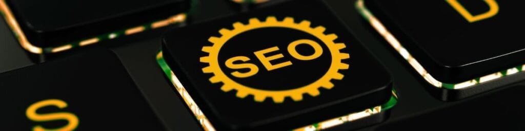 Clavier d'ordinateur contenant une touche SEO pour les services SEO de Ly Rédaction
